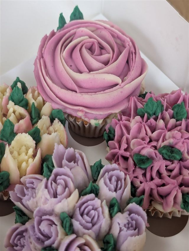 Decorated cupcakes with buttercream piping